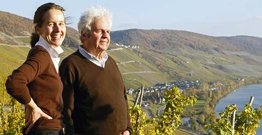 Prüm family in front of vineyards